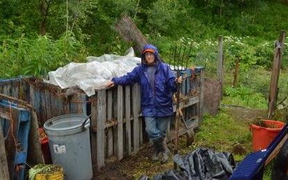 Alys with her compost piles